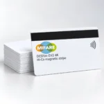 Illustrative MIFARE DESFire EV2 4K Hi-Co magnetic stripe contactless card beside a stack of white cards